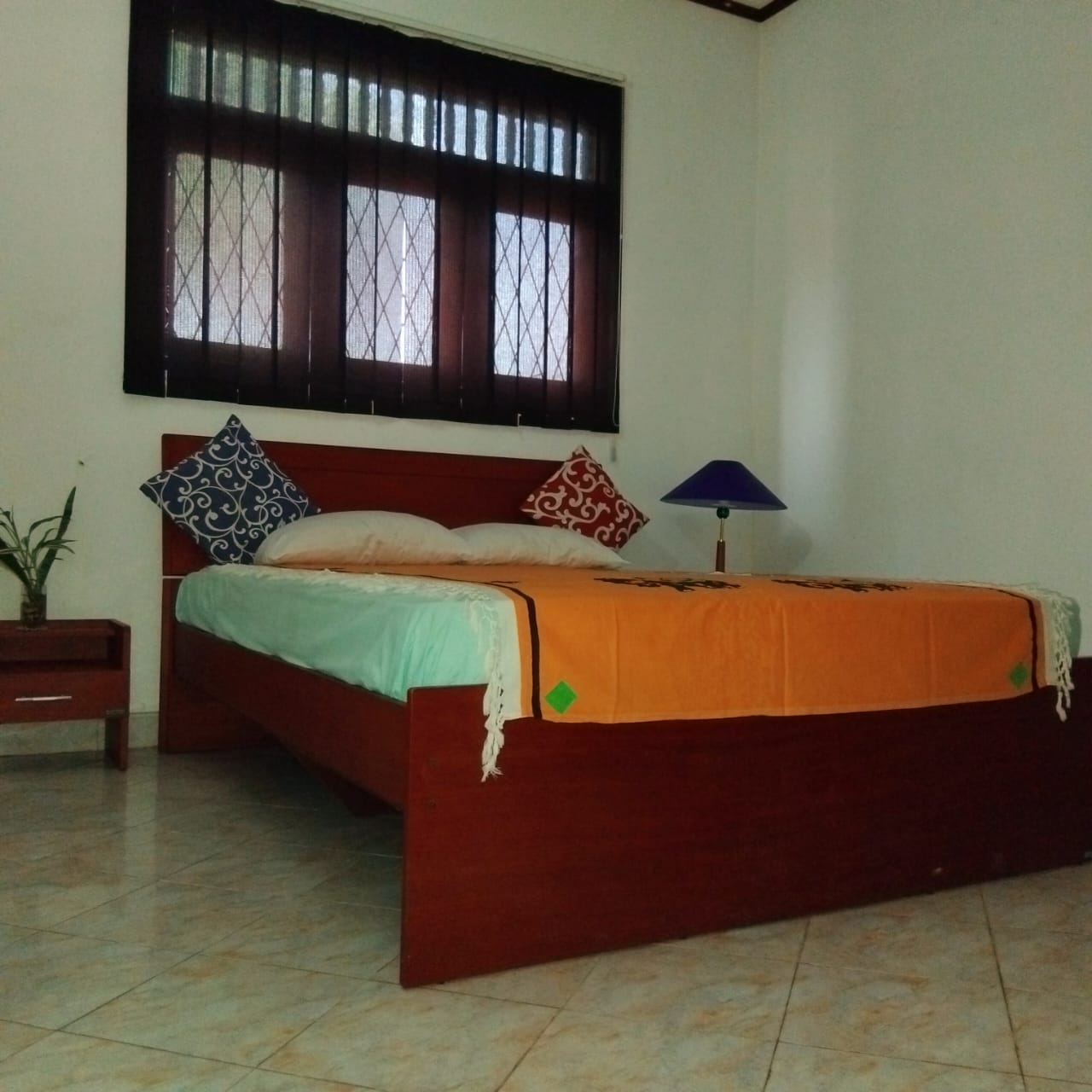Neatly done bed and large bed room